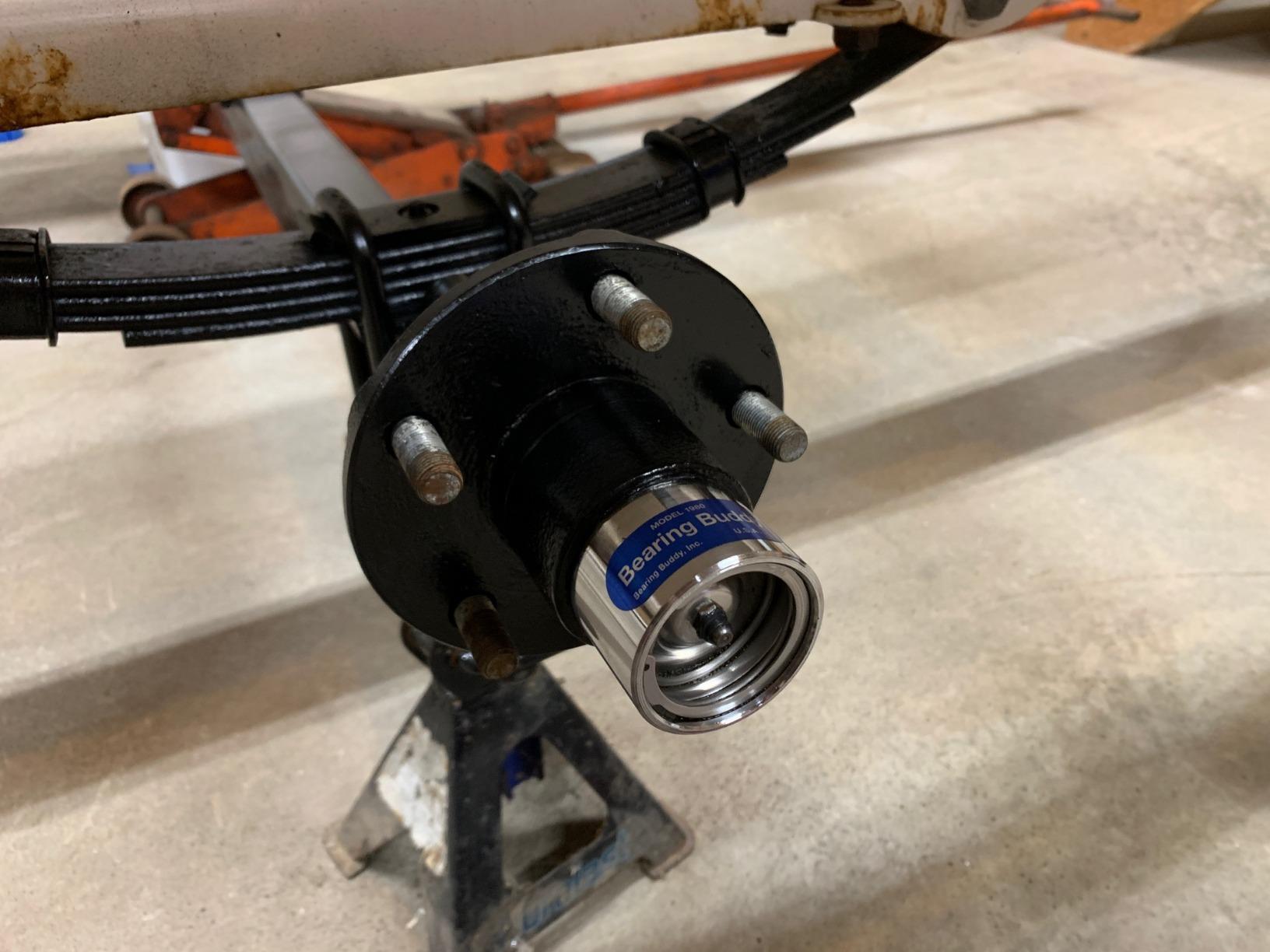 Bearing Buddy Bra 19B - 1 Pair USA-Made, Black Vinyl Bearing Buddy Covers - Protects and Keeps Grease Off the Trailer Wheels - Fits Bearing Buddy Models: 1980, 1980A, 1938, 1968, 2047, 2080, & 2080T customer photo 1