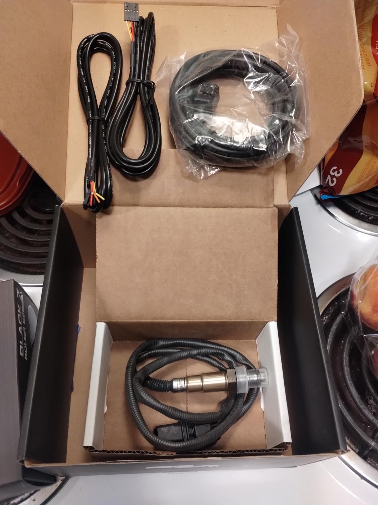 GlowShift Black 7 Color Digital Wideband Air/Fuel Ratio AFR Gauge Kit - Includes Oxygen Sensor, Data Logging Output, Weld-in Bung & Wiring - Multi-Color LED Display - Clear Lens - 2-1/16