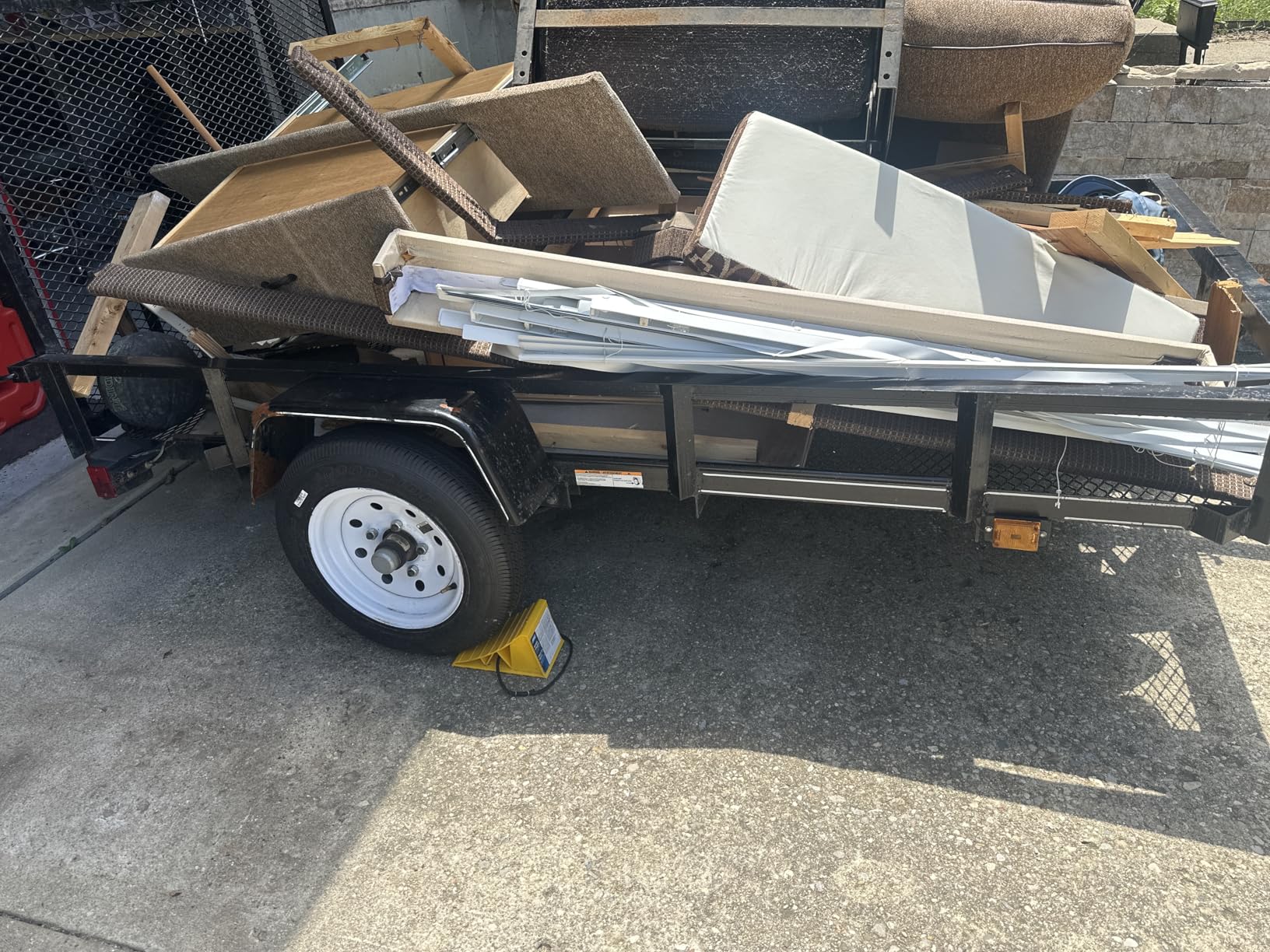 Camco Camper & RV Wheel Chock with Rope - Keeps Trailer in-Place - Compatible with Wheels Up to 26