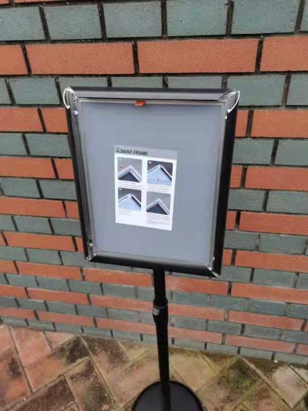 DISPLAYSWORKER Adjustable Poster Sign Stand 11 x 17,Floor-Standing Sign Holder with Heavy Duty Pedestal,Aluminum Snap-Open Frame , Vertical and Horizontal View Sign Displayed, Black (11 x 17) customer photo 1