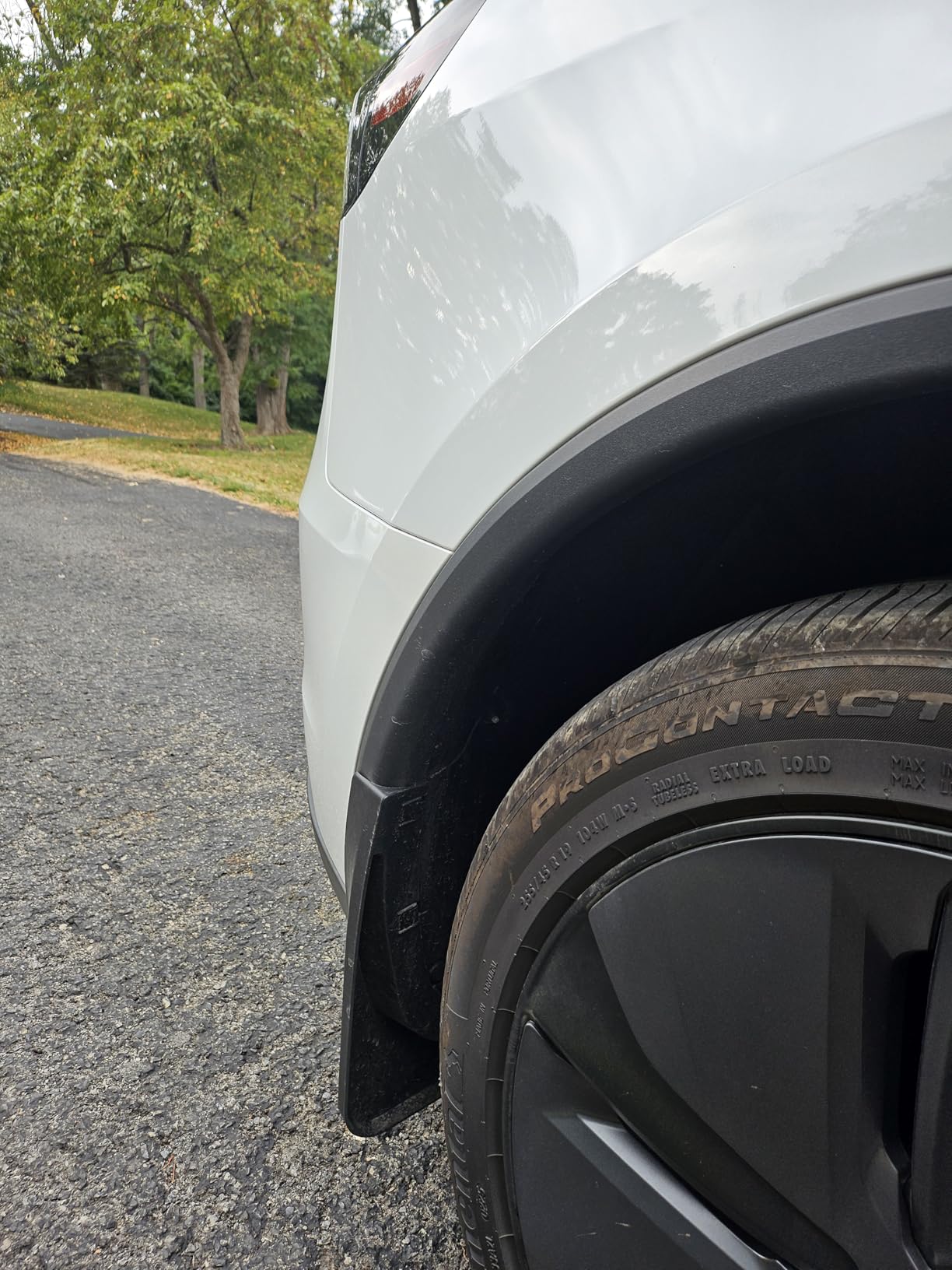 BASENOR 2024-2020 Tesla Model Y Mud Flaps Splash Guards Vehicle Sediment Protection No Drilling No Tape Mudflaps Tire Protector Mudflaps All Weather Tesla Exterior Accessories (Set of 4) customer photo 2