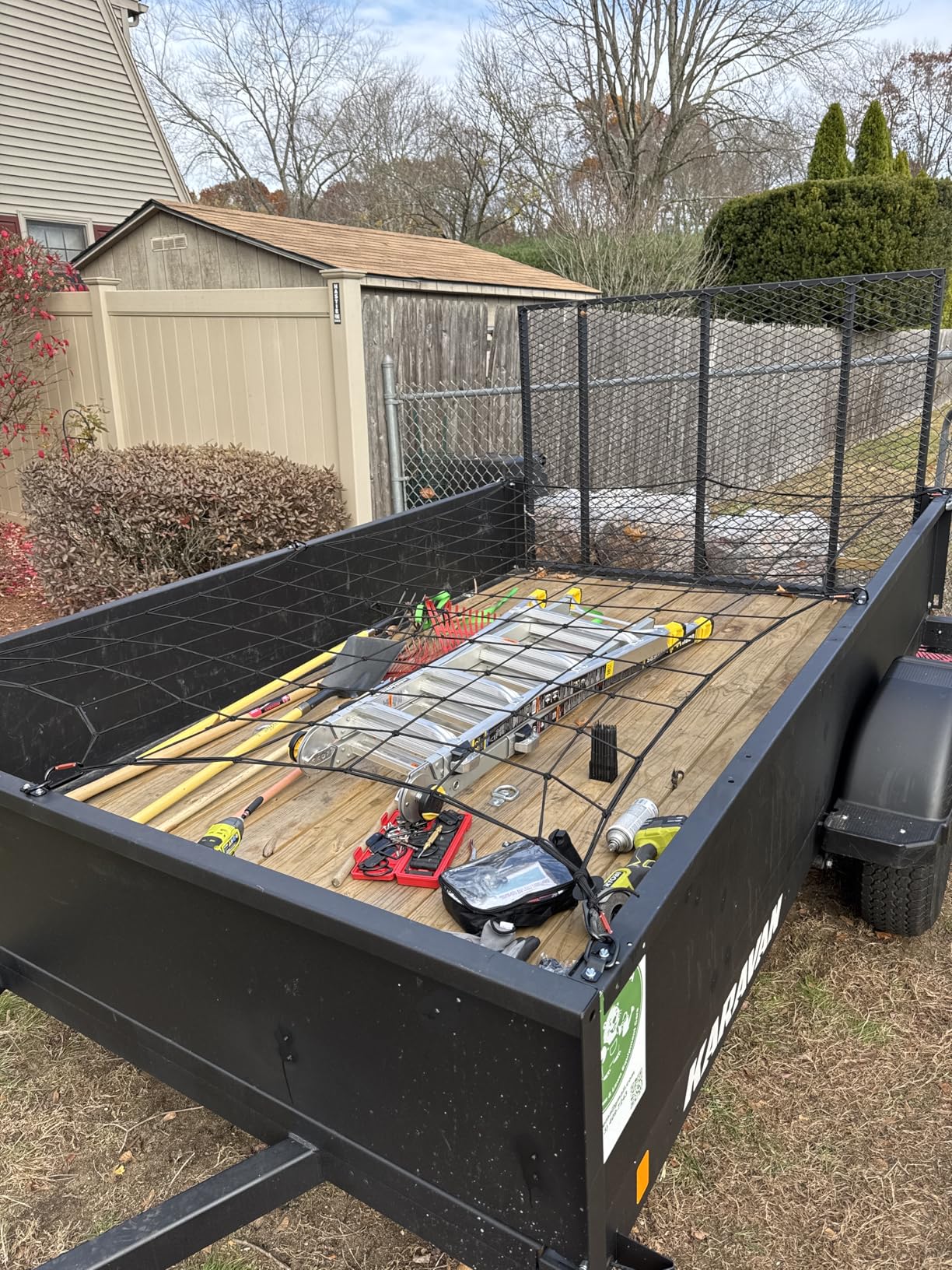 Heavy Duty Cargo Net for Pickup Truck Bed - Stretches from 5' x 7' to 15' x 21' - 12 Metal Carabiners - Compatible with Ford, Dodge RAM, Chevy, Toyota - Ideal for (Black, 5X7 Feet) customer photo 1