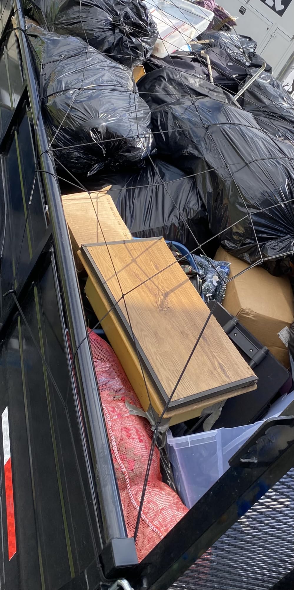 Heavy Duty Cargo Net for Pickup Truck Bed - Stretches from 5' x 7' to 15' x 21' - 12 Metal Carabiners - Compatible with Ford, Dodge RAM, Chevy, Toyota - Ideal for (Black, 5X7 Feet) customer photo 2