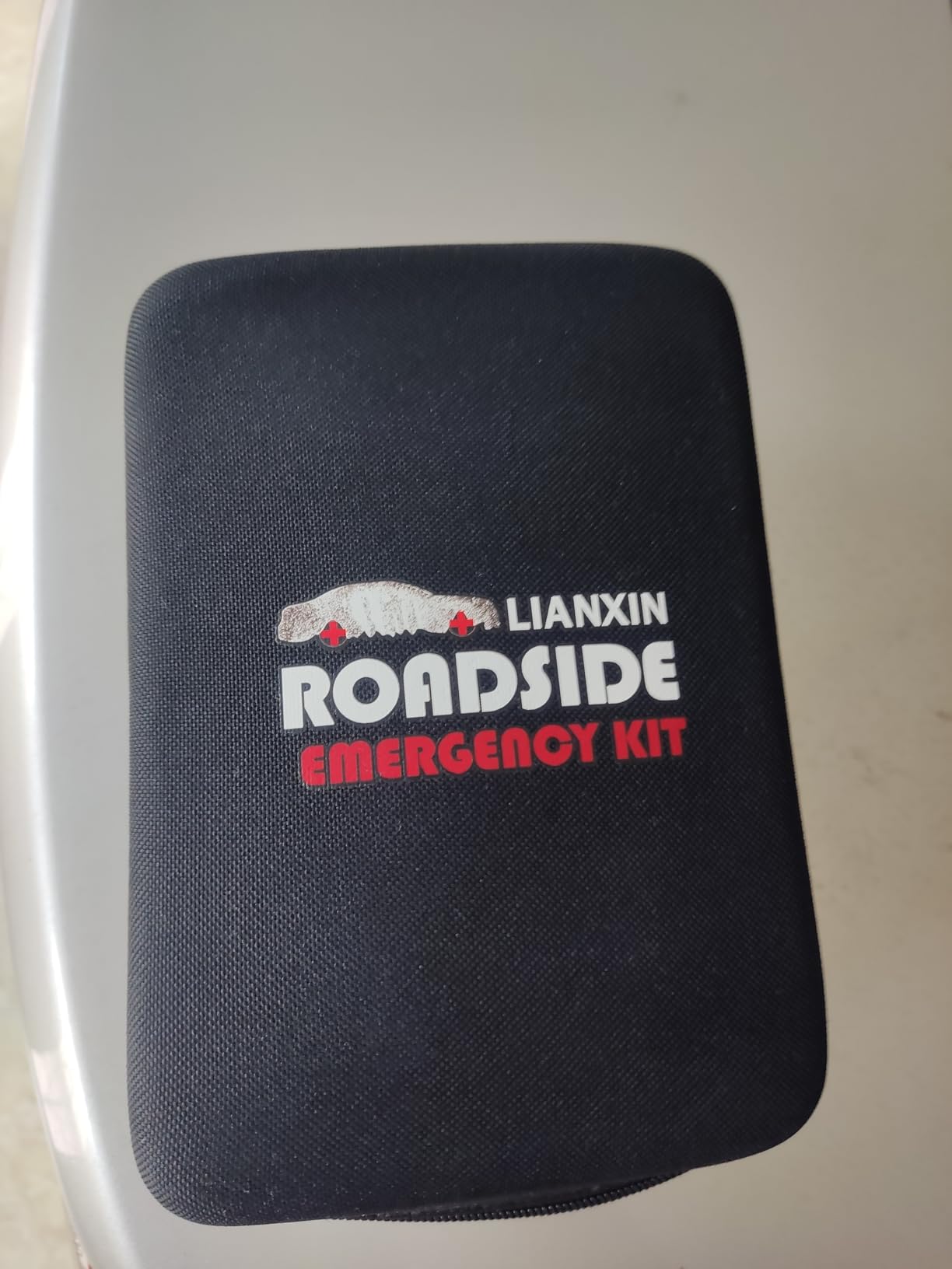 Car Roadside Emergency Kit, with Jumper Cables Automotive Kit,Car Safety Roadside Assistance Kit Headlamp,Tow Straps, Safety Hammers, Rainwear, Gloves.Black customer photo 2