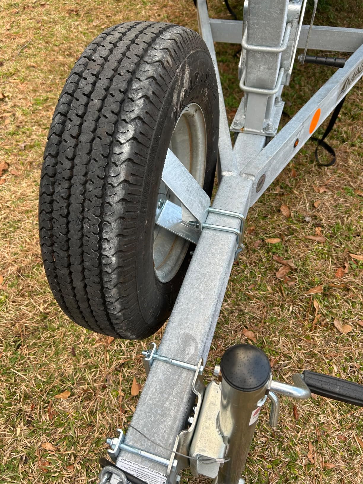 CE Smith - 27310G Heavy Duty Side Mount Spare Tire Carrier for Trailer - Holder for 4 or 5 Lug Wheels Up to 15