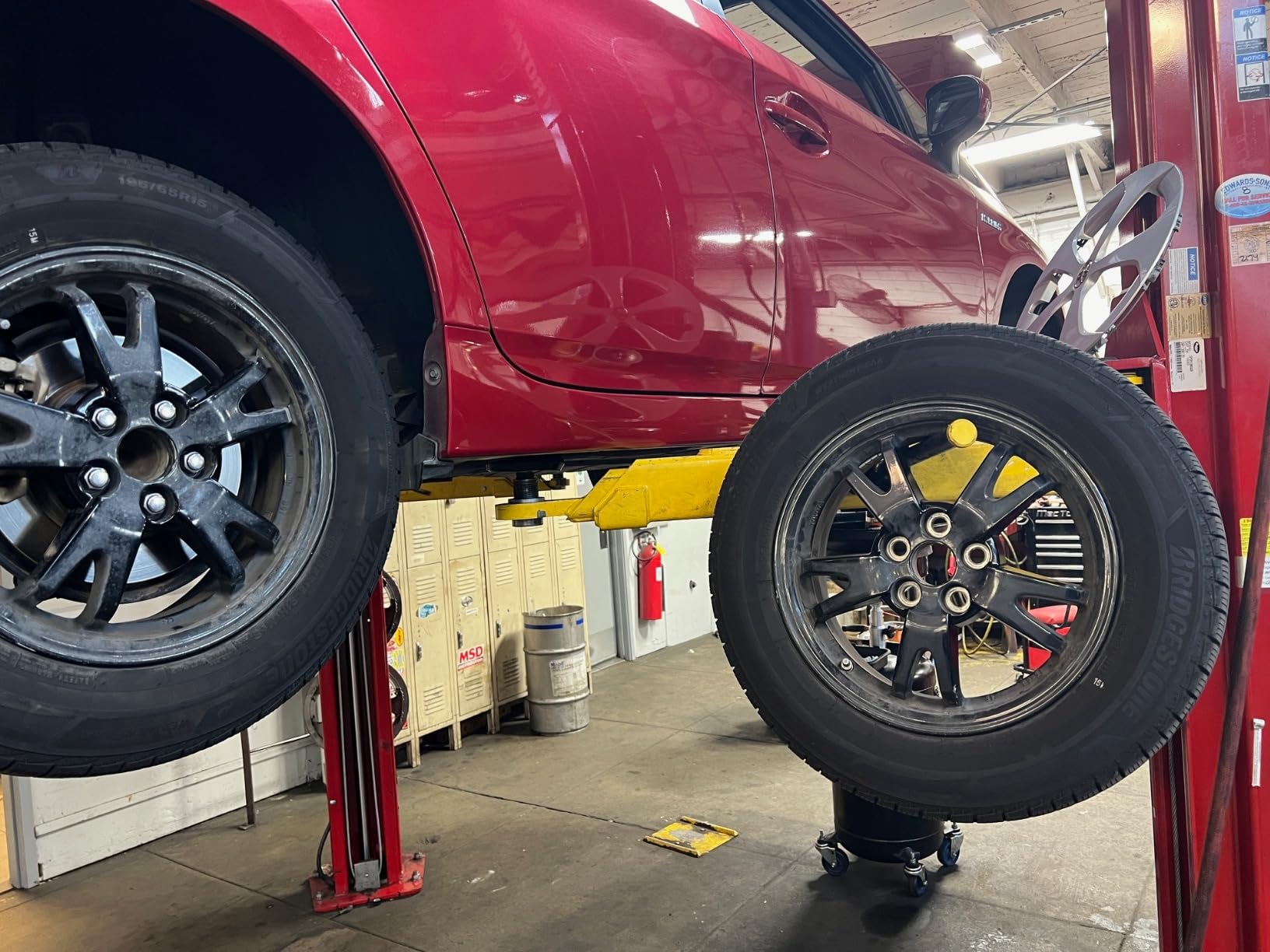 Omega Lift 92100 Wheel Arm Kit 2 Pack - Hanging Tires on Post Lift Arm for Car Tire Rotation Changer Brake Jobs and more customer photo 1