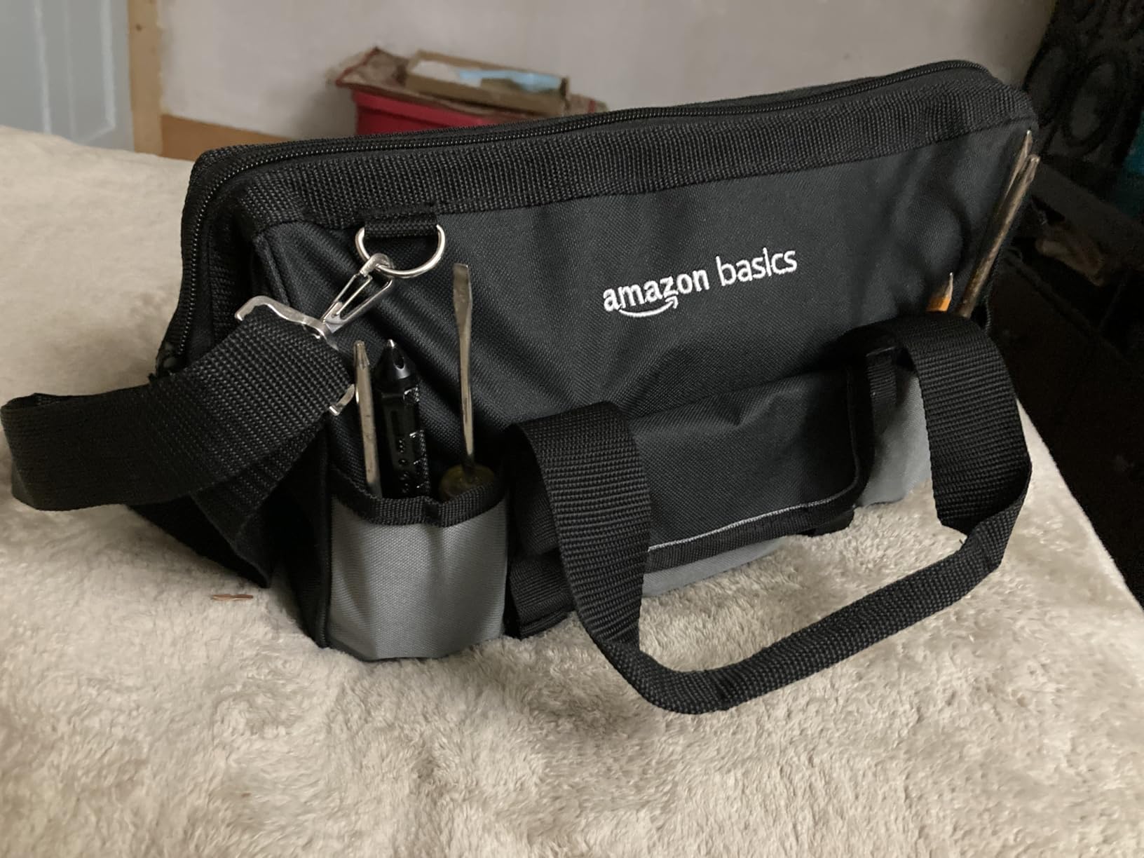 Amazon Basics Durable Wear-Resistant Tool Storage Bag with Adjustable Shoulder Strap, Portable Tool Organizer, 16 in, Black & Grey customer photo 2