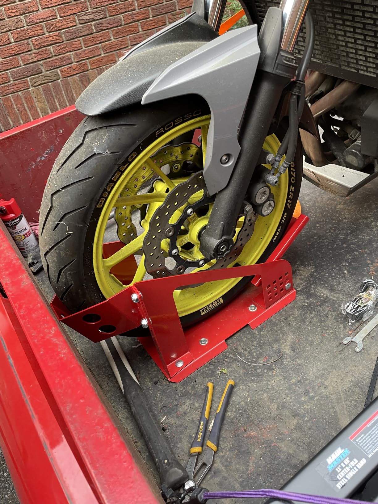 Jack Boss Motorcycle Wheel Chock, Motorcycle Stand Up to 1800 Lbs, Wide Range Less Than 6 Inch, 12 Holes Support Adjustable Front Tire Stand Chocks for Most Motorcycle customer photo 2