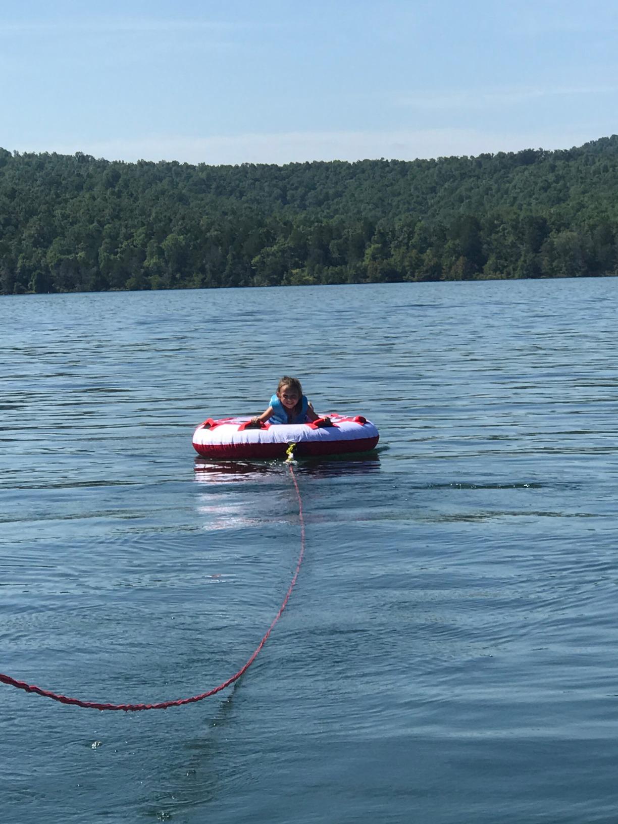 Airhead Hot Shot Towable Tube for Boating, 1-2 Rider Inflatable Boat Tube for Water Tubing, Round Deck for Air Time, Full Nylon Cover, Padded Handles with Neoprene Knuckle Guards customer photo 2