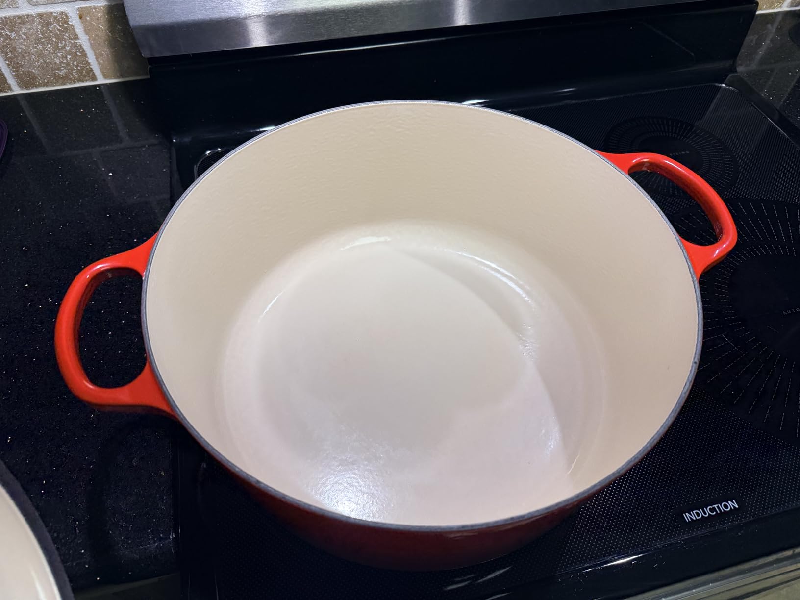 Le Creuset Enameled Cast Iron Signature Round Dutch Oven, 7.25 qt., Cerise customer photo 2