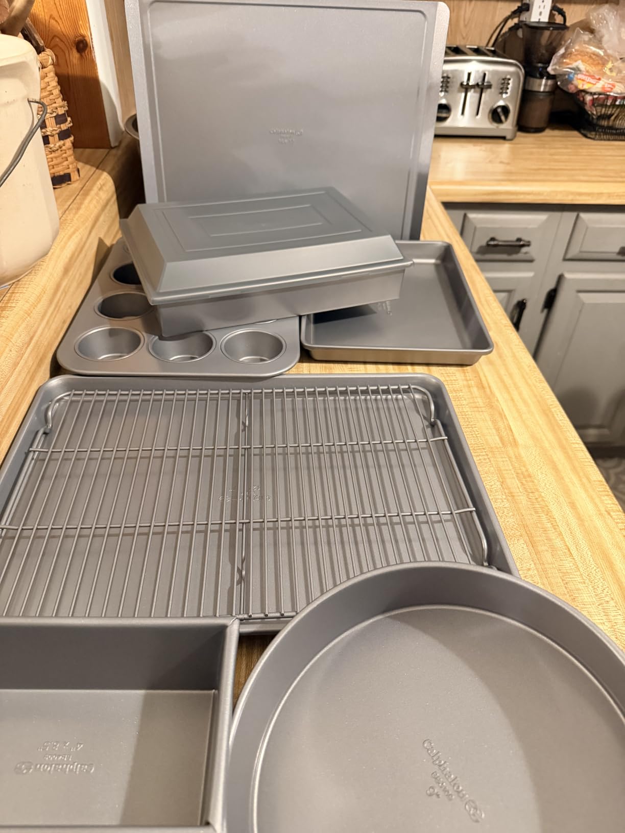 Calphalon Titan 10-Piece Nonstick Bakeware Set, Baking Sheet Set, Steel Core PFA-Free Nonstick Coating, Oven Safe, Includes Sheet Pans, Muffin Pan, Round Cake Pans, Loaf Pan and Cooling Rack - Silver customer photo 1