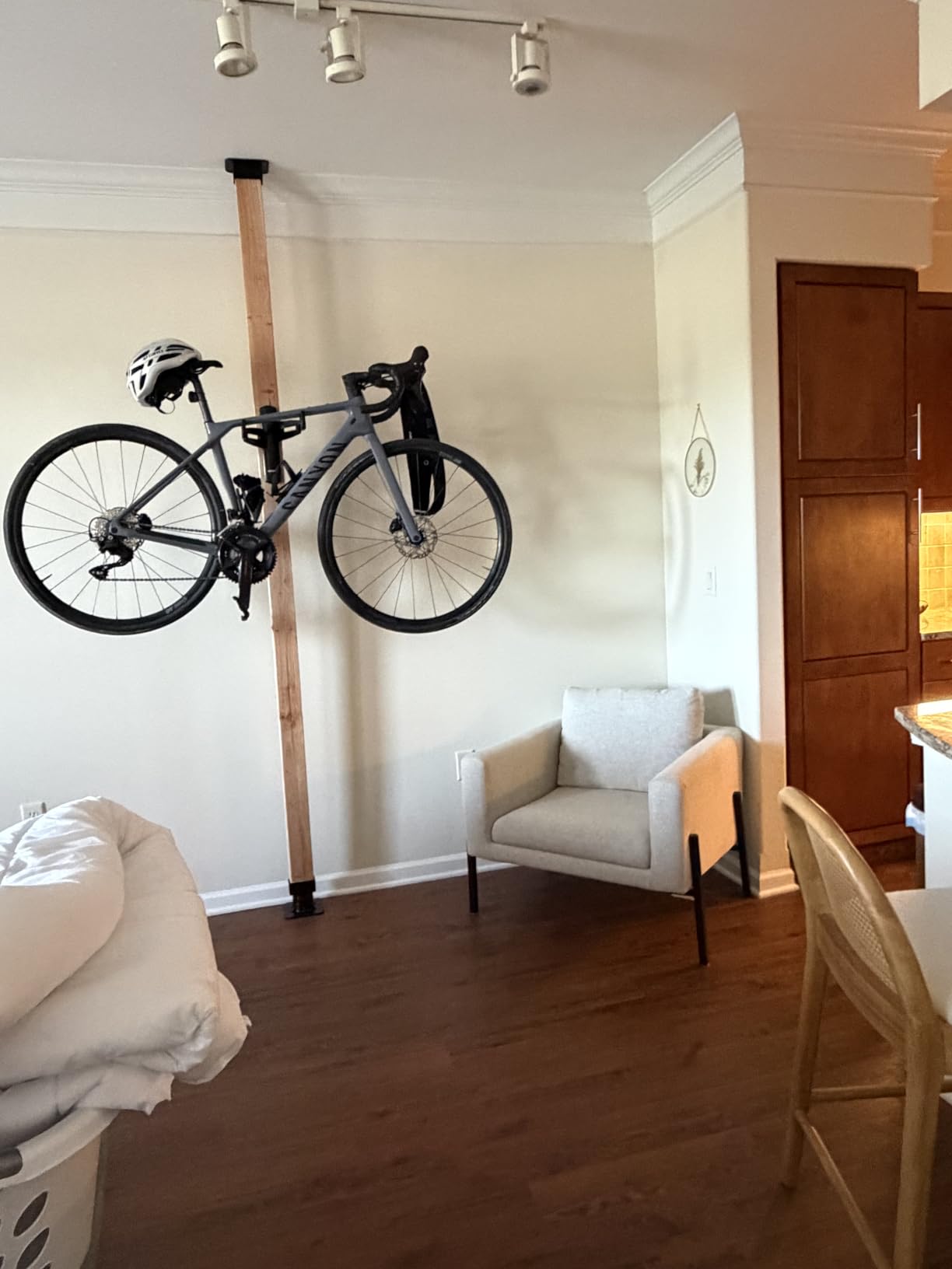 Feedback Sports Velo Wall Rack 2D Bike Storage Hangar Mount Adjustable Arms | Road, gravel and MTB compatible; soft rubber cradles protect finishes and support up to 50 lb in tight spaces customer photo 1