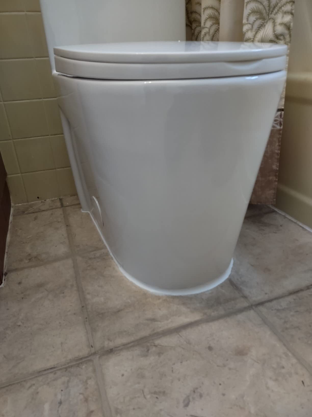 St. Tropez Comfort Height One-Piece Elongated Toilet, Vortex Dual-Flush 1.1/1.6 GPF, White Hardware customer photo 1