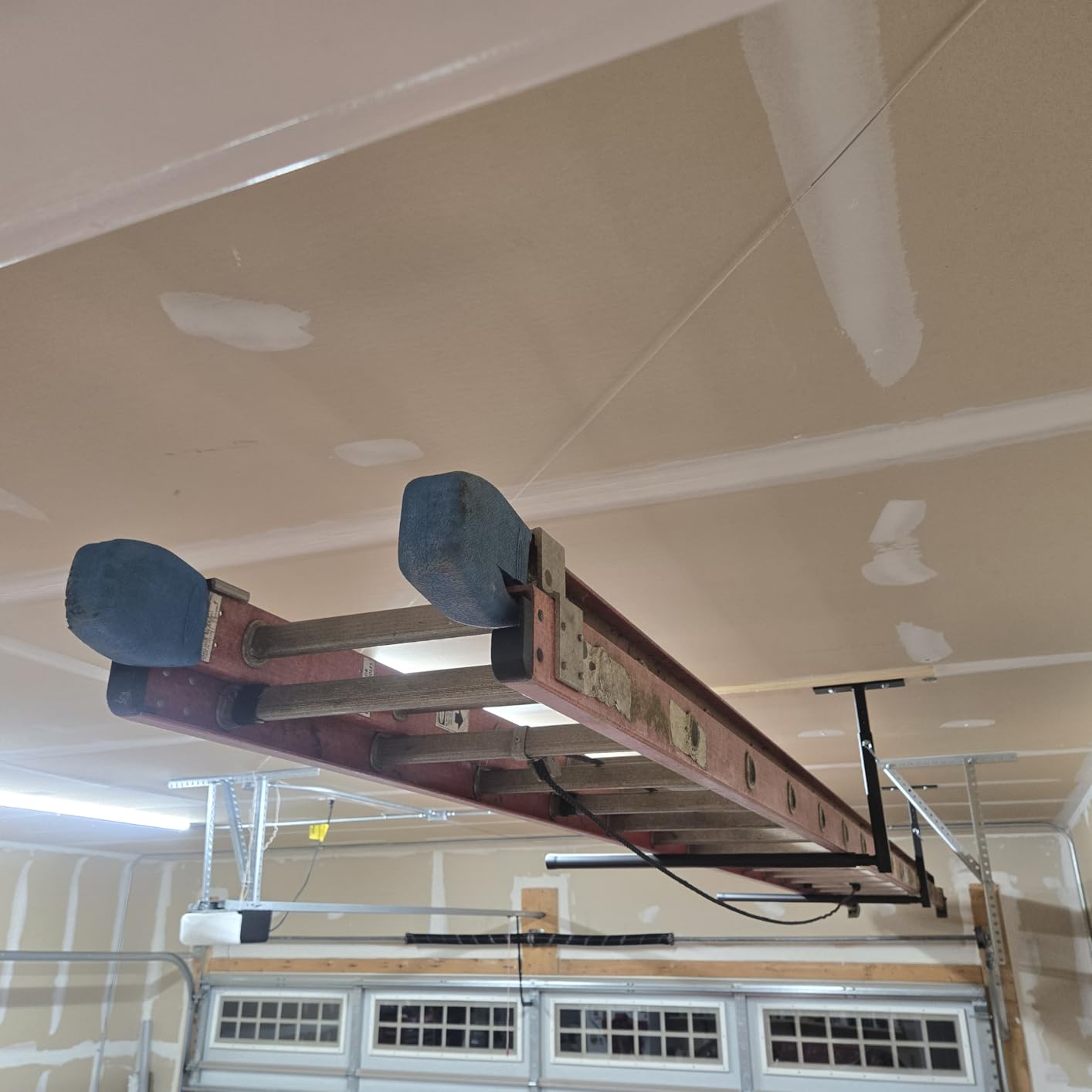 StoreYourBoard Adjustable Overhead Ladder Rack - Garage Organizer Ladder Shelf for Step & Extension Ladders - Storage Racks and Shelving for Garage Organization - Ceiling Mounted - Holds 150 lbs customer photo 1