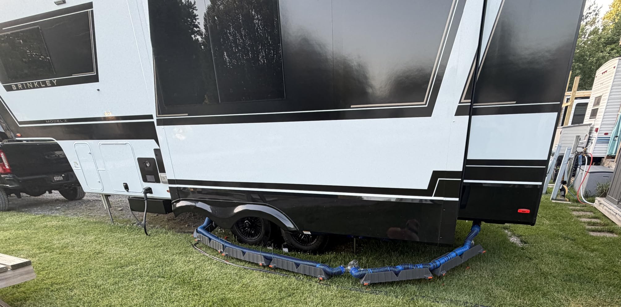 Camco Rhino RV Sewer Hose Support Kit - Up to 10 Inches of Lift - Features Nesting Design for Easy RV Storage - Includes 6 Sections 30 Inches with 4 Stakes Each - Supports Up to 20-Feet of RV Sewer Hose (43071) customer photo 1