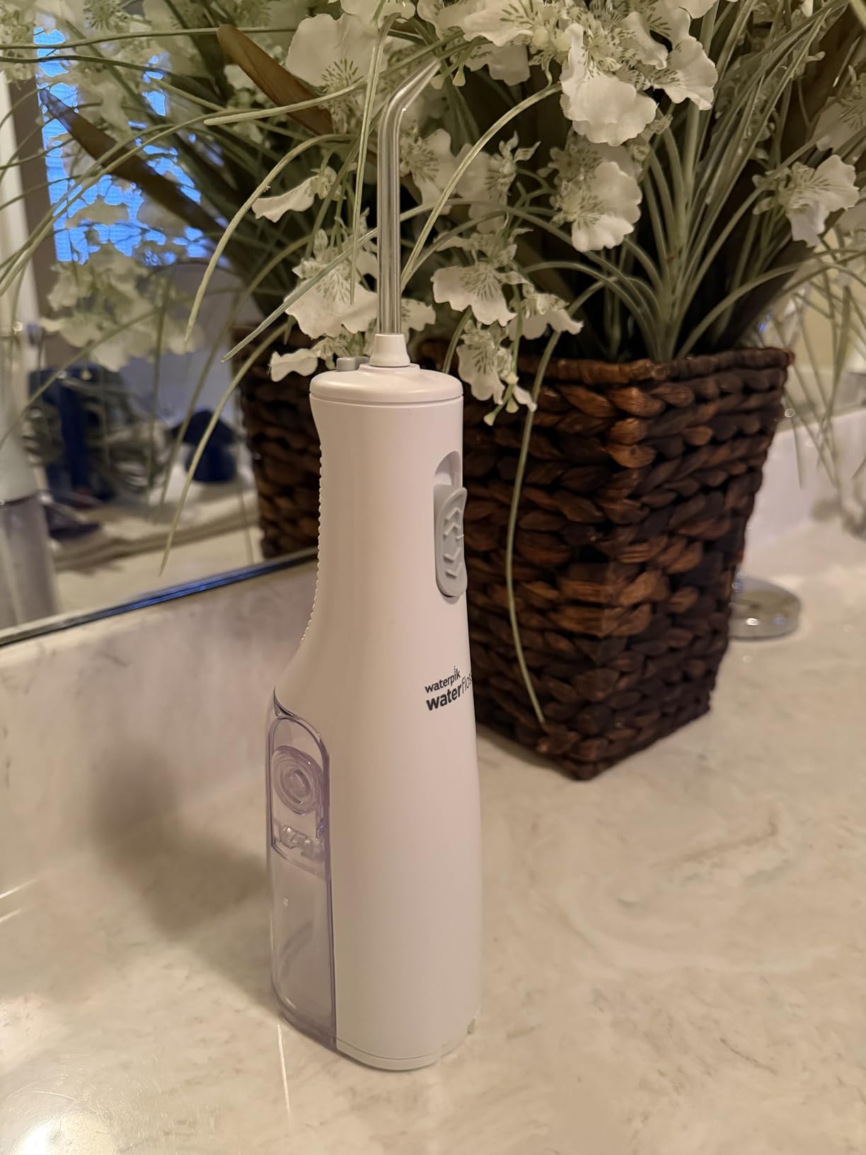 Waterpik Cordless Express Portable Water Flosser, 3 AA Batteries, White | 2 Settings, 2 Tips, for Daily Gum Health & Cleaning Teeth, Travel, Shower Use, ADA Accepted, WF-02 customer photo 1