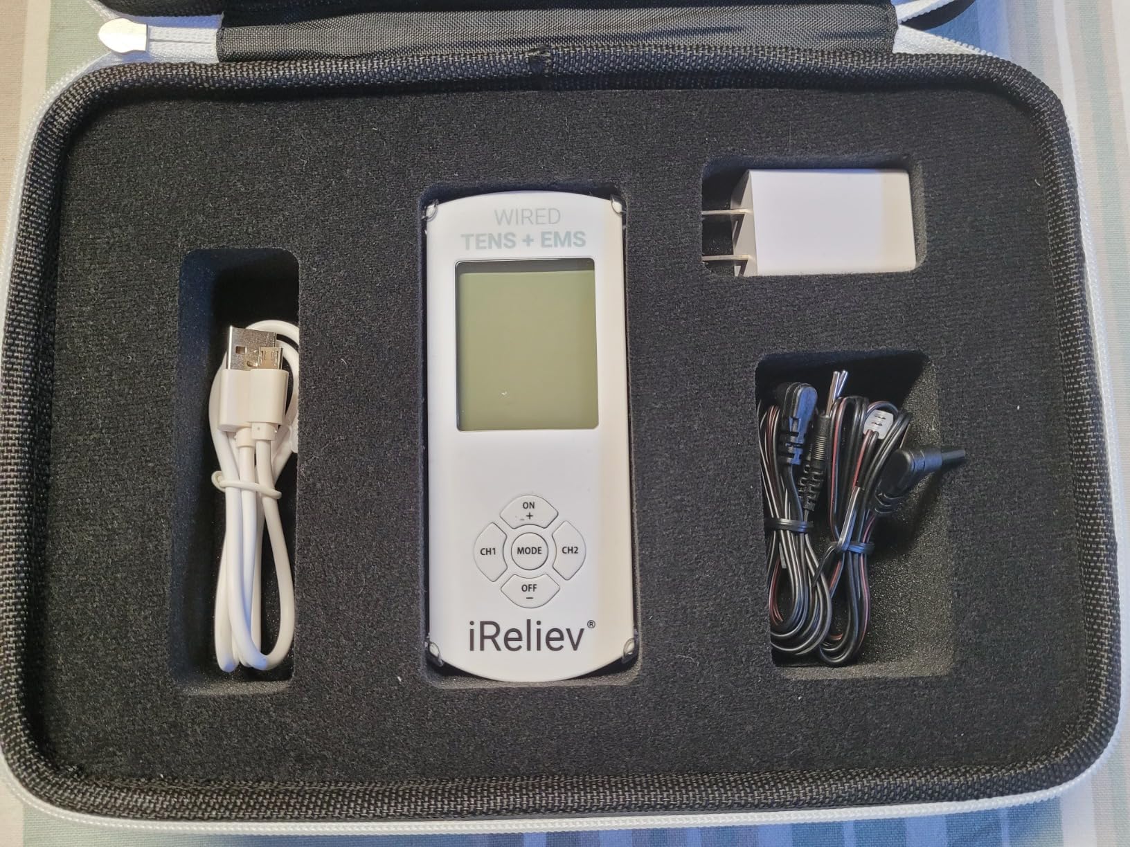 FDA Cleared iReliev TENS Unit + EMS 14 Therapy Modes, Premium Pain Relief and Recovery System, Rechargeable, Large Back Lit Display, 12 Electrodes & Case customer photo 1