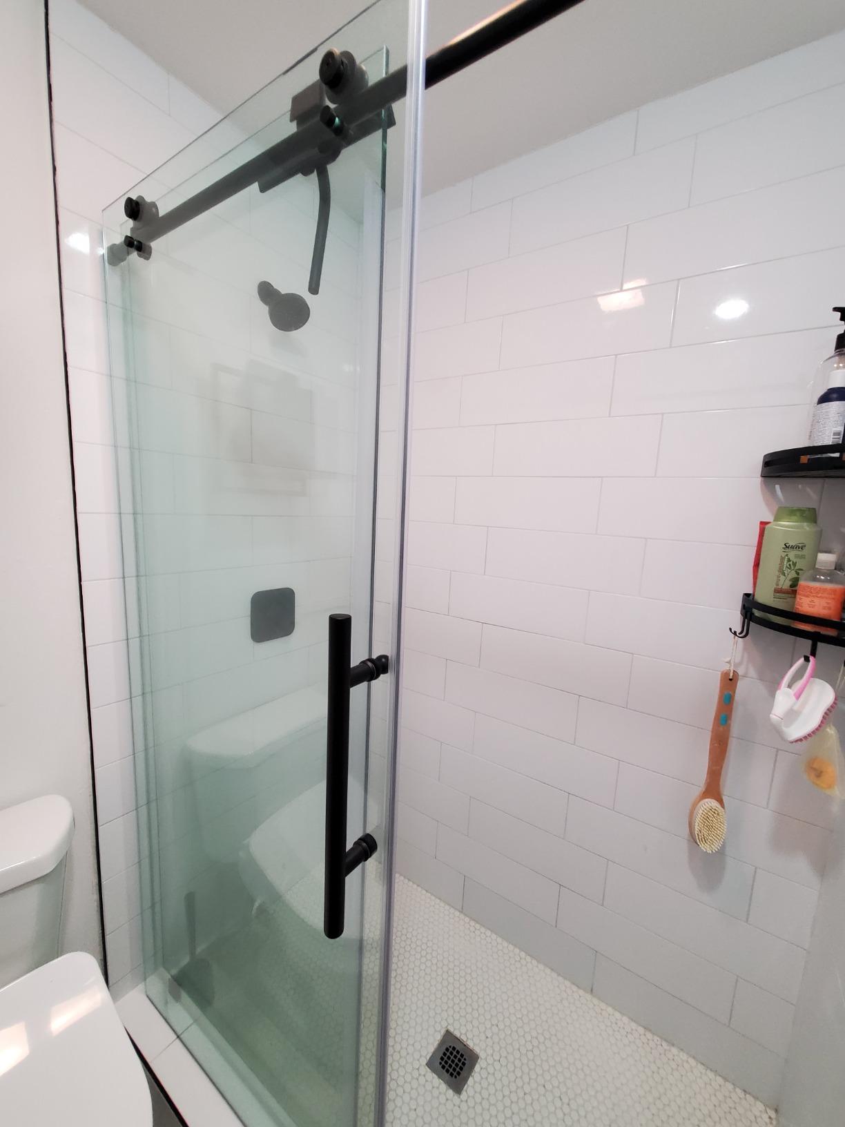 Woodbridge Frameless Sliding Shower Door, 56