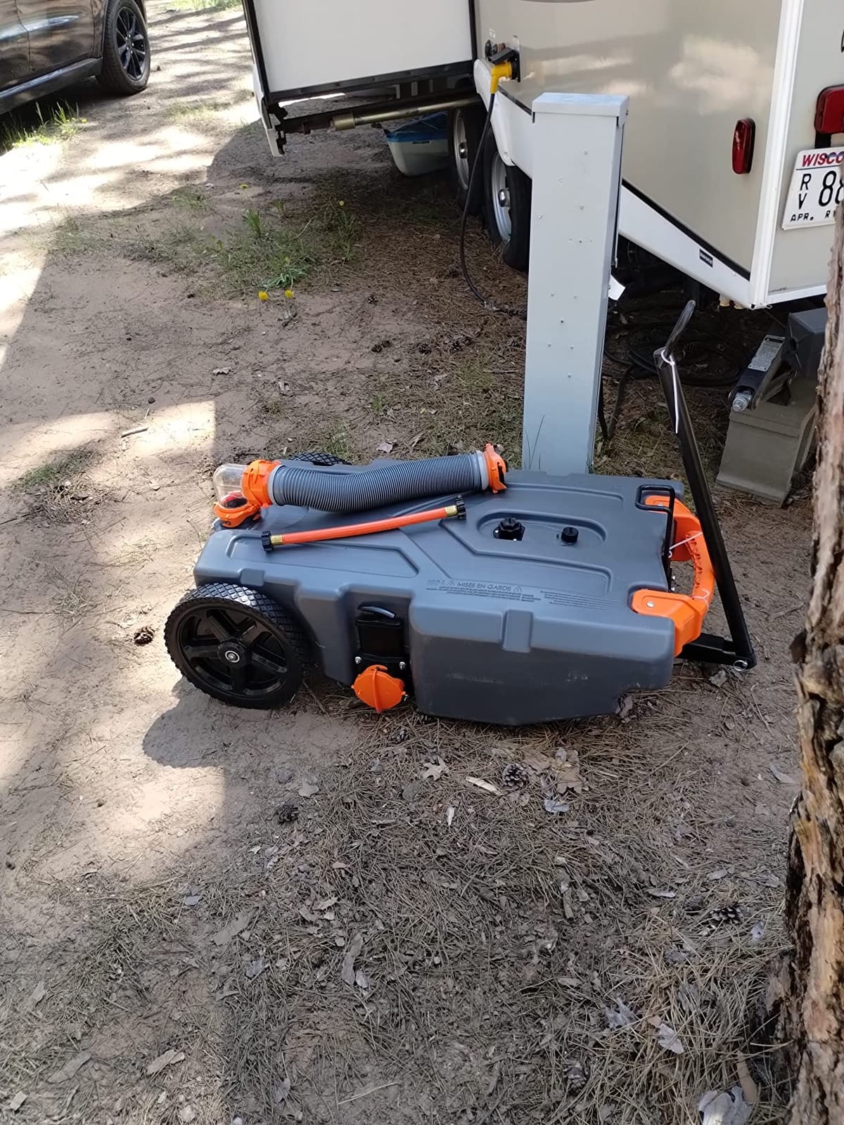 Camco Rhino 36-Gallon Portable Camper/RV Tote Tank with Steerable Wheels (39007) customer photo 1