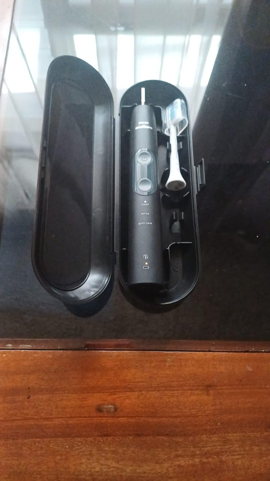 Philips Sonicare ProtectiveClean 5300 Rechargeable Electric Toothbrush, with Pressure Sensor, 3 Cleaning Modes, SmarTimer and QuadPacer, with 2 Bonus Brush Heads, Travel Case, Black, Model HX6423/34 customer photo 2