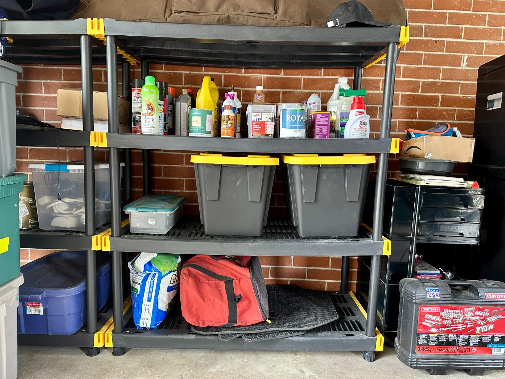 CX 4-Tier Heavy Duty Plastic Storage Shelves for Garage Organization | Freestanding garage utility rack with easy assembly, 4 shelves at 200lbs/Shelf, 55H x 48W x 20D, Black & Yellow, Made in USA customer photo 1
