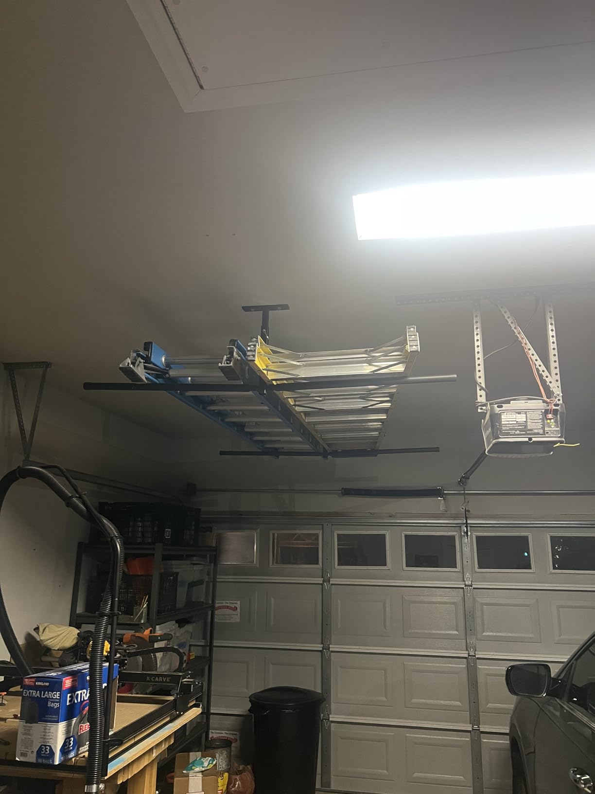 StoreYourBoard Adjustable Overhead Ladder Rack - Garage Organizer Ladder Shelf for Step & Extension Ladders - Storage Racks and Shelving for Garage Organization - Ceiling Mounted - Holds 75 lbs customer photo 2