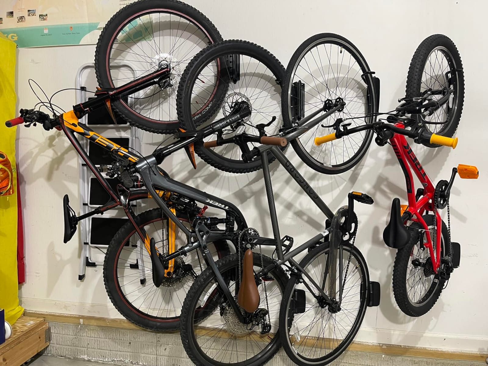 monTEK Swivel Bike Wall Mount, Bike Hangers for Garage, 2 Pack | Heavy-duty vertical wall bike storage rack swivels 150 degrees to save space; holds 66 lb each and fits tires up to 3.54 in wide customer photo 2