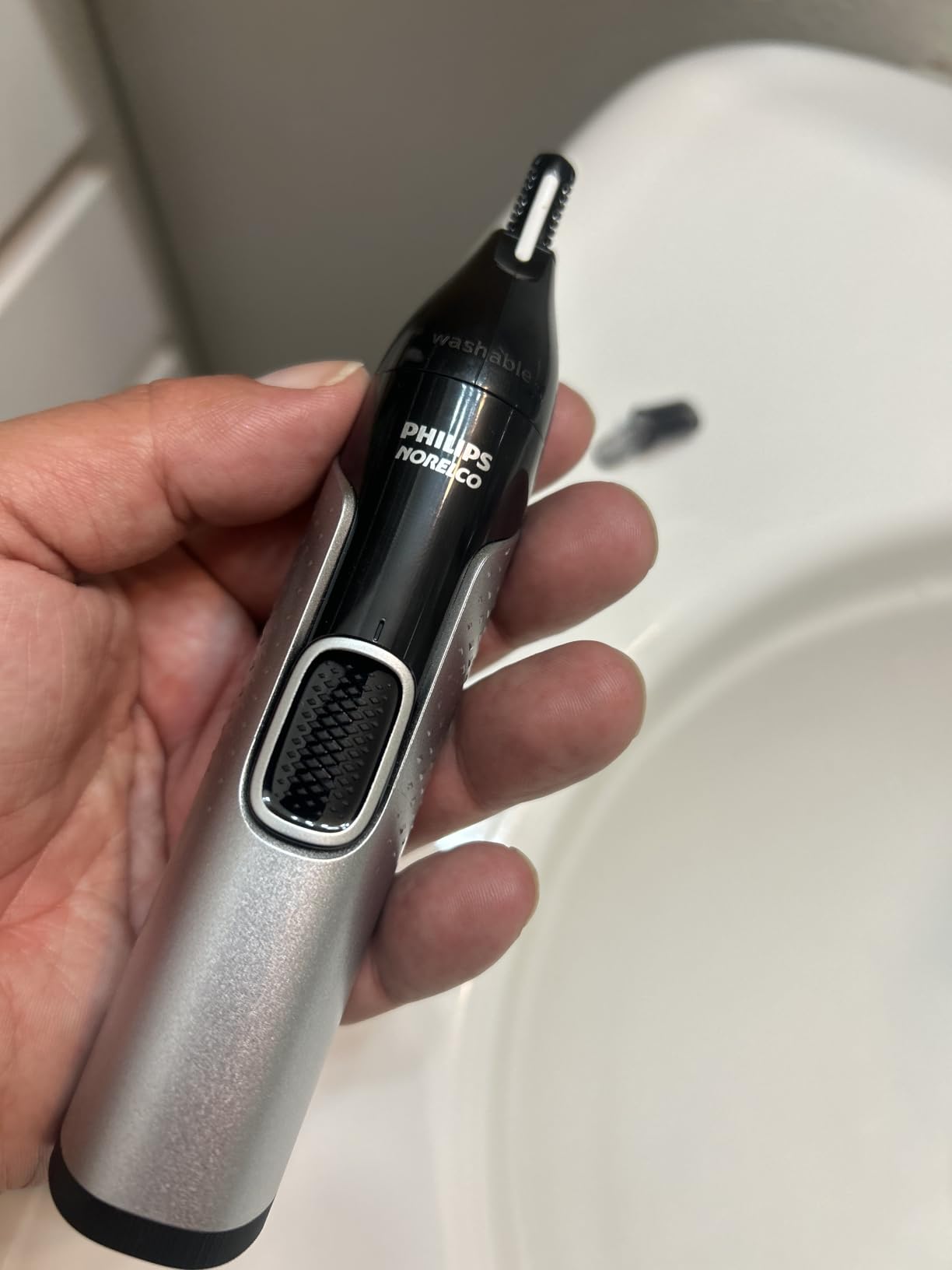 Norelco Philips Nose Trimmer 5000 for Nose, Ears, Eyebrows & Details, Protective Guard System, Dual-Sided Steel Blades, Eyebrow Combs, Rotary & Detail Trimmer, Washable, AA Battery, NT5600/62 customer photo 1