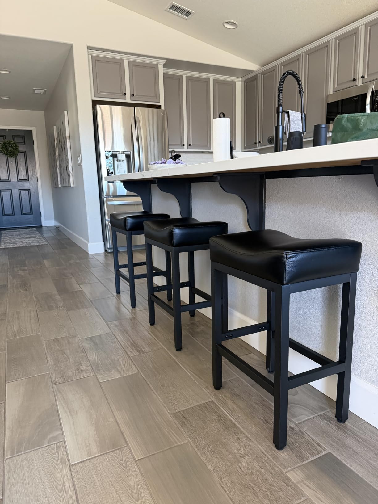 Raynesys 24 Inche Bonded Leather Counter Height Bar Stools Set of 2 Square | Barstools with Thick Bonded Leather Saddle Seats & Heavy Duty Metal Base for Kitchen Counter, Easy Assembly, All Black customer photo 2