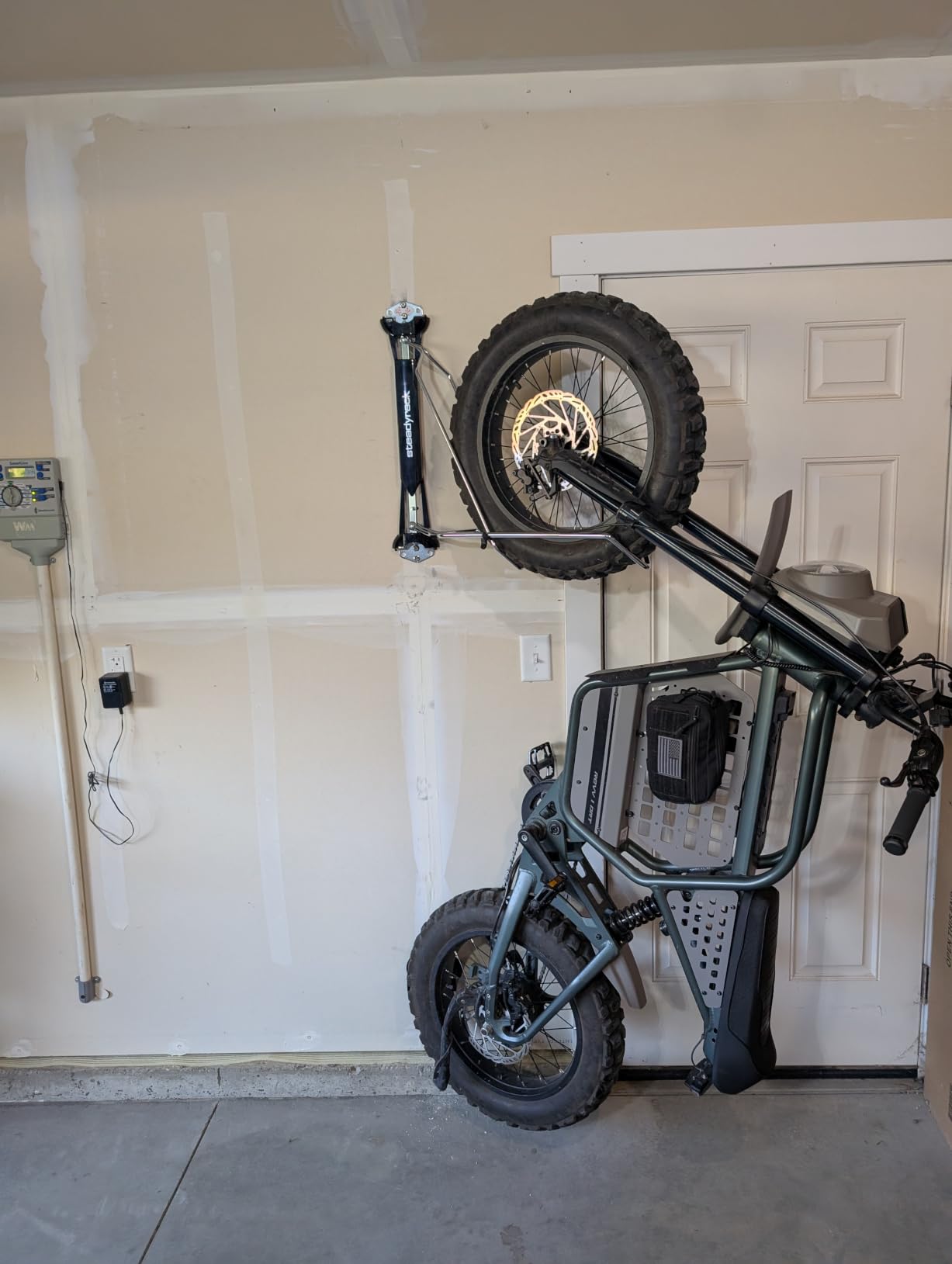 Steadyrack Swivel Bike Wall Mount, Vertical Bike Rack for Garage Storage | Roll-in design, no heavy lifting. Holds road and gravel bikes to 77 lb, steel build, fits apartments, sheds. customer photo 1
