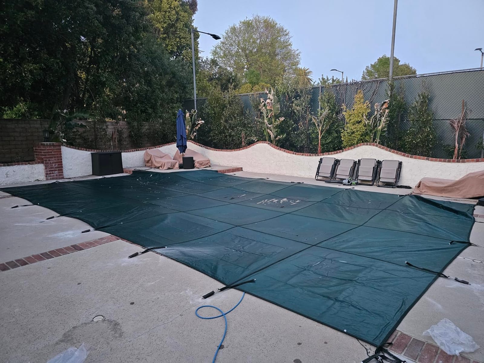 VEVOR Pool Safety Cover, Fits 16x32ft Rectangular Inground Winter Swimming Pools, with 4x8ft Center End Step, Triple Stitched, High Strength Mesh PP, Great Rain Permeability, Installation Hardware customer photo 1