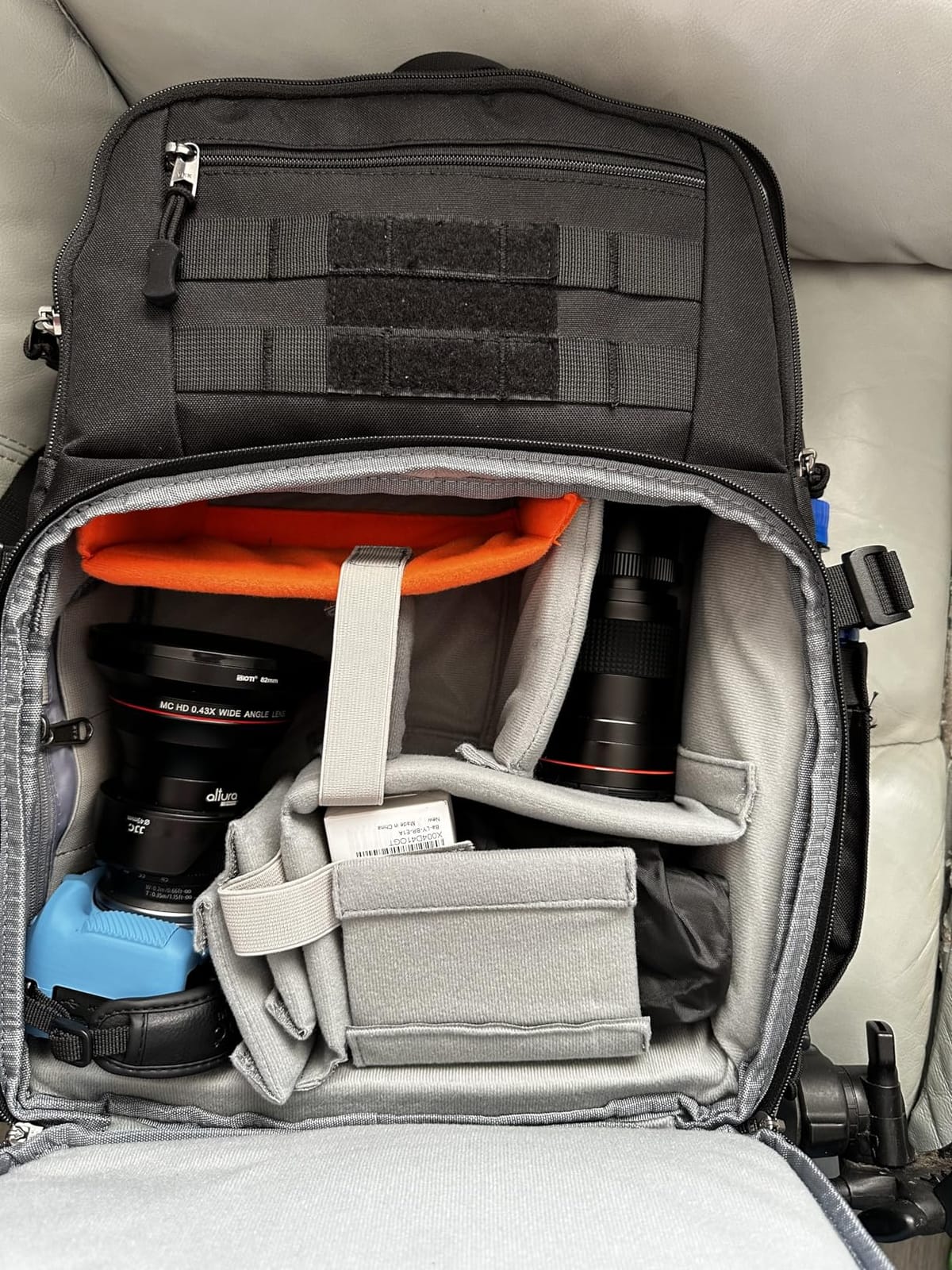 RAINSMORE Camera Backpack, DSLR/SLR/Mirrorless Camera Bag for Photographers | 15.6 Inch, Waterproof Tactical Photography Backpack Case, with Rain Cover & Tripod Holder customer photo 2