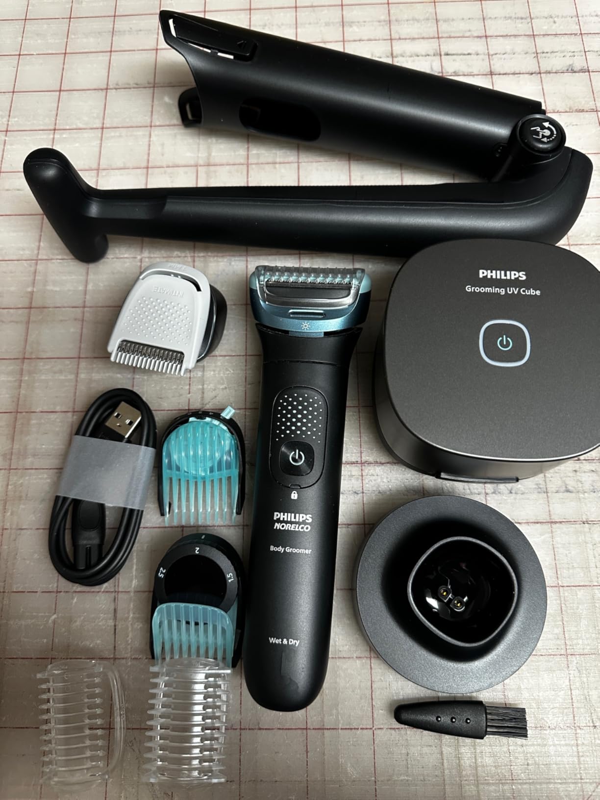 Philips Norelco Body Groomer 9000, Body & Balls, Dual Head Trimmer & Shaver | Dual Head Trim & Shave, UV Sanitizer Cube, 11 Lengths, Bi-Directional Shave Combs, 120-Min Runtime, Showerproof, BG9485/50 customer photo 2