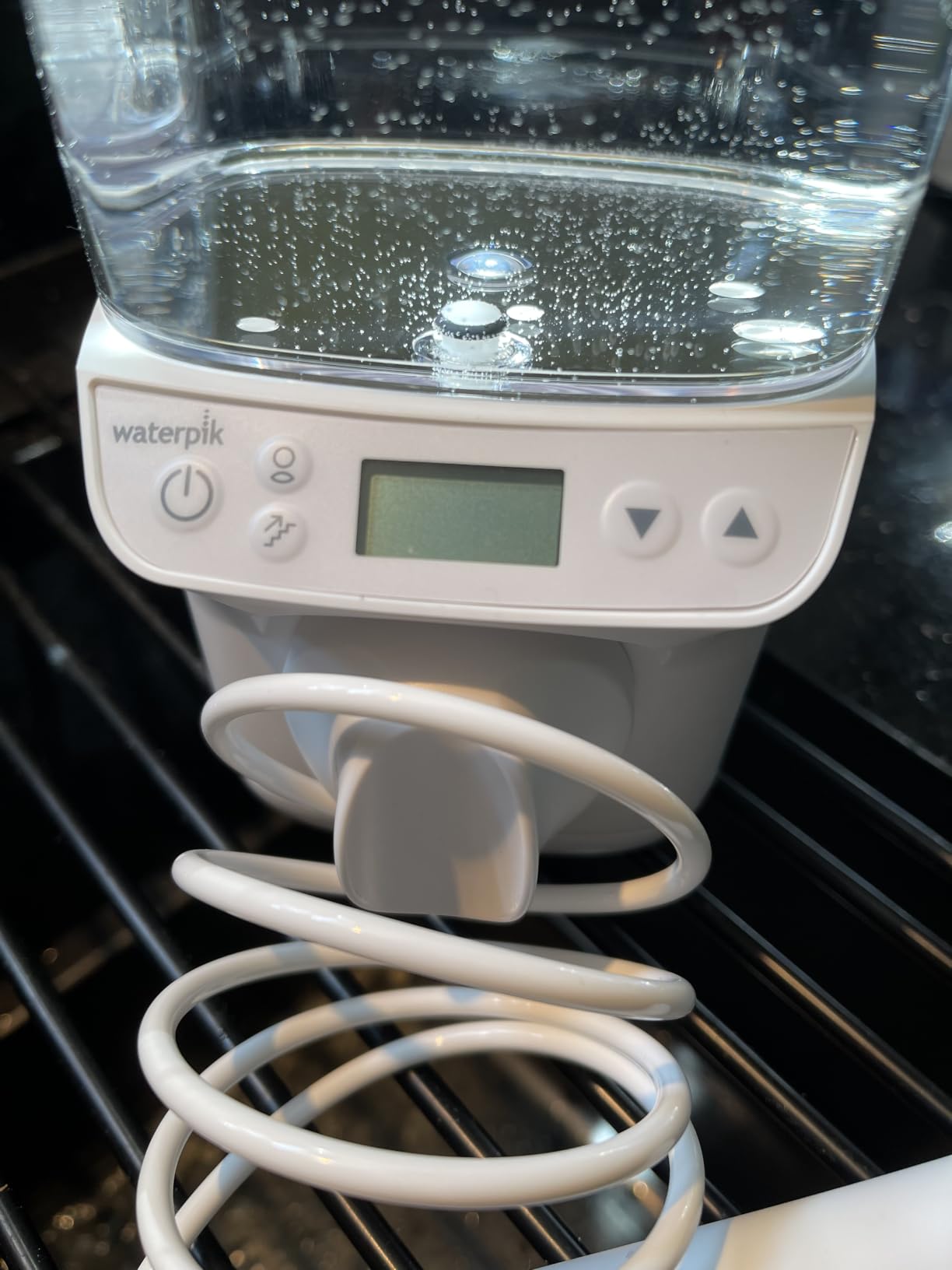 Waterpik Promax Water Flosser with SmartAdvance Mode for Daily Gum Health and Cleaning Teeth, Braces, Implants, ADA Accepted, Small Quiet Design, Electric Flosser with 10 Settings, 5 Tips, WF-23 customer photo 1