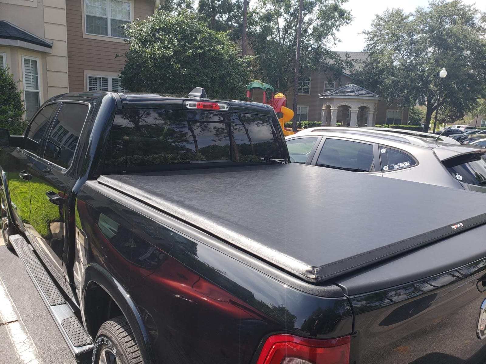 RealTruck TruXedo TruXport Soft Roll Up Truck Bed Tonneau Cover | 284901 | Fits 2019-2025 Dodge Ram 1500 w/RamBox, w/or w/o Multifunction Tailgate 5' 7