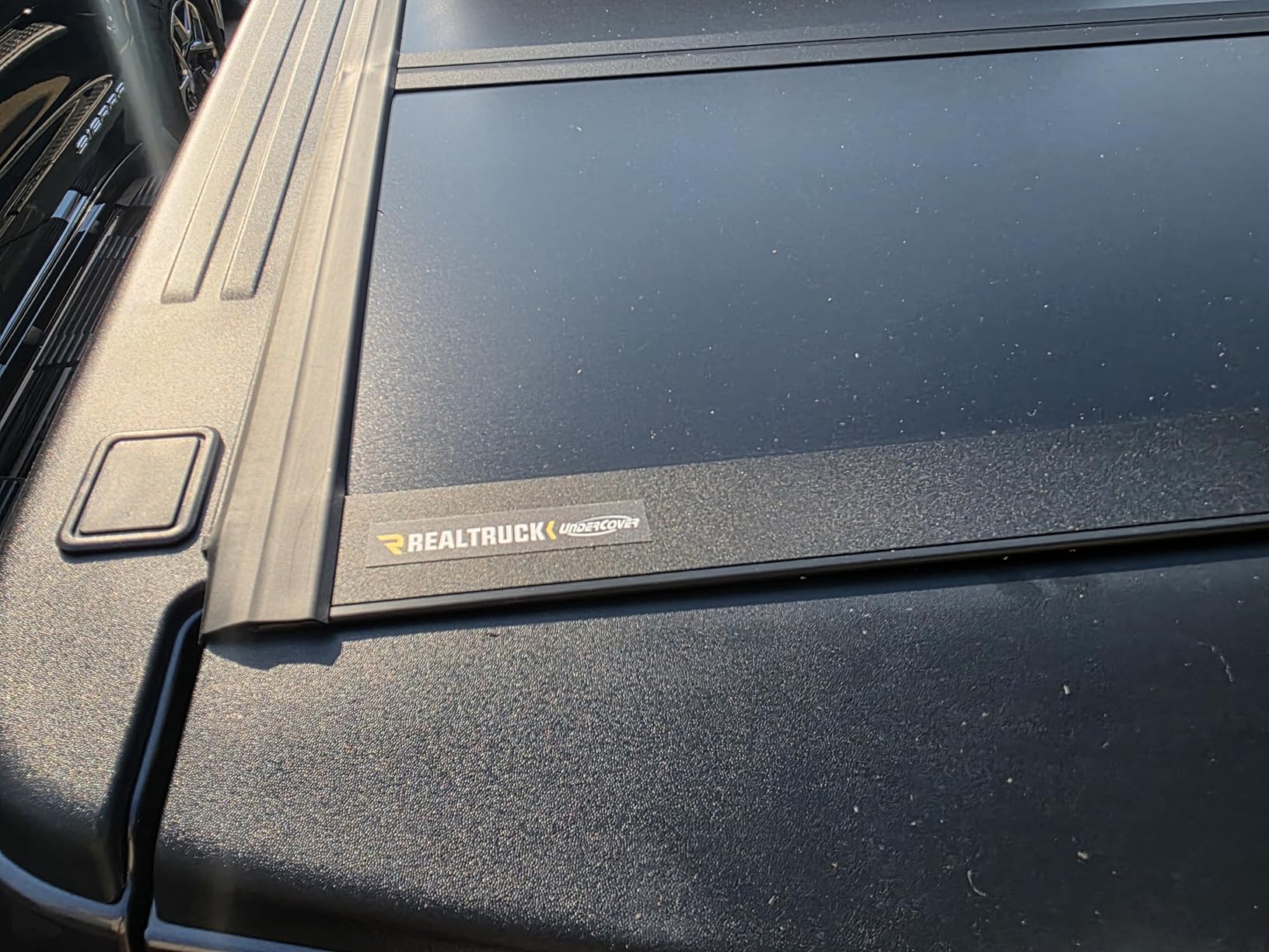 Undercover Ultra Flex Hard Folding Truck Bed Tonneau Cover | UX32008 | Fits 2019-2025 Dodge Ram 1500, Does Not Fit w/Multi-Function (Split) Tailgate 5' 7