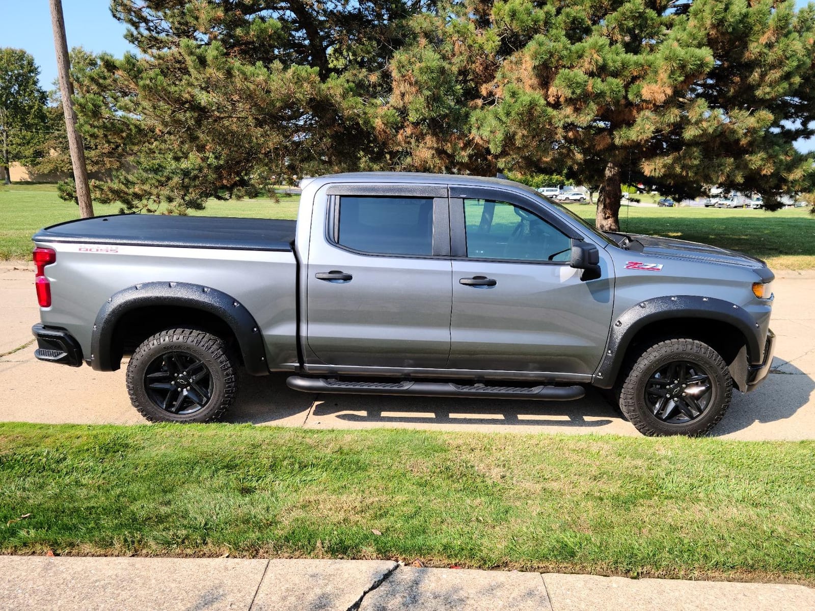 Undercover SE One-Piece Truck Bed Tonneau Cover | UC1176 | Fits 2019-2025 Chevy/GMC Silverado/Sierra 1500 (Does not fit Carbon Bed) 5' 10