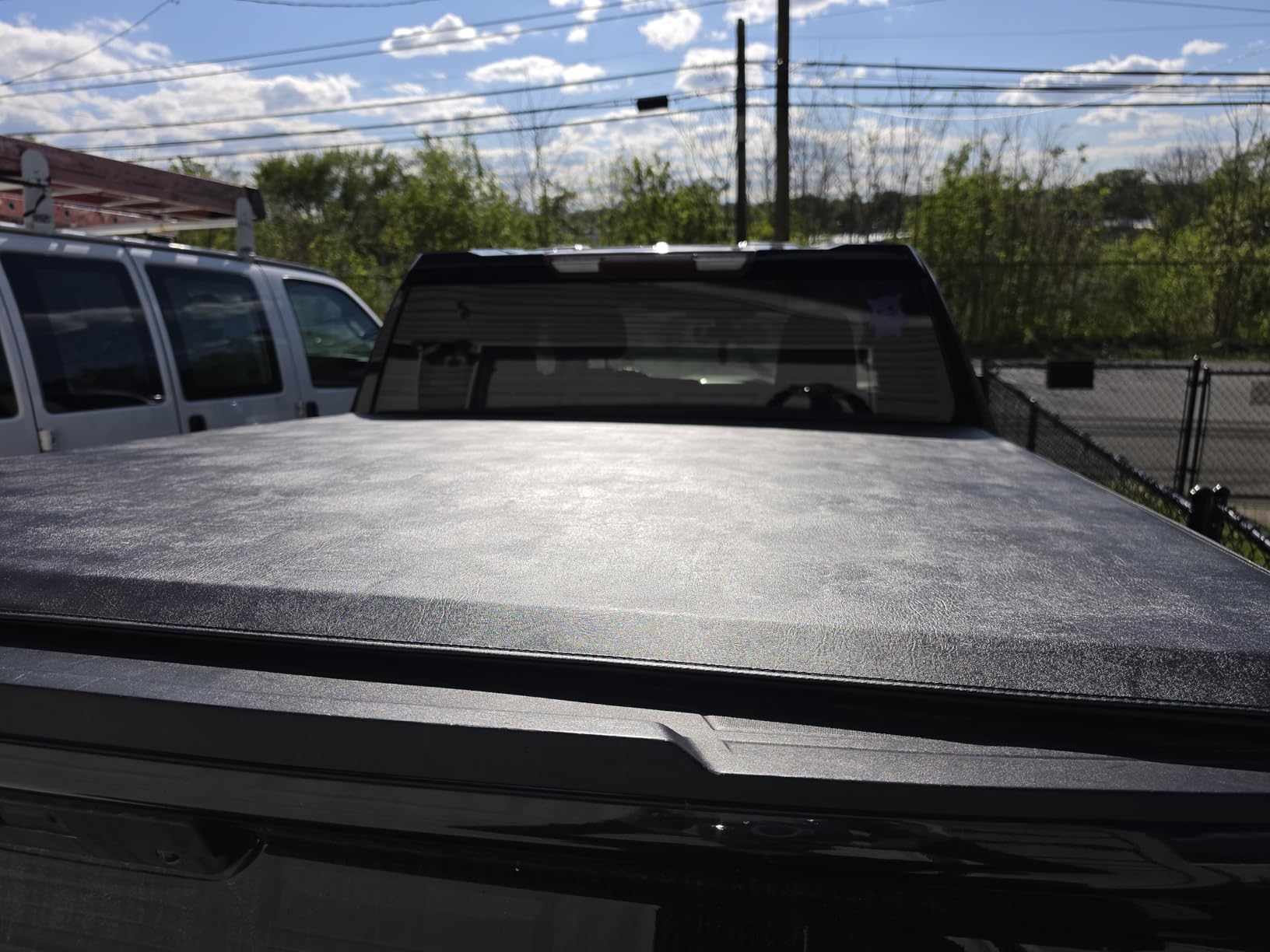 Amazon Basics Soft Roll-Up Truck Bed Tonneau Cover, 6.5 ft, Water-Resistant, Works with Bed Liners for 2014-2019 Chevy Silverado, GMC Sierra 1500, 2015-2018 Silverado Sierra 2500 3500 HD, Fleetside customer photo 1