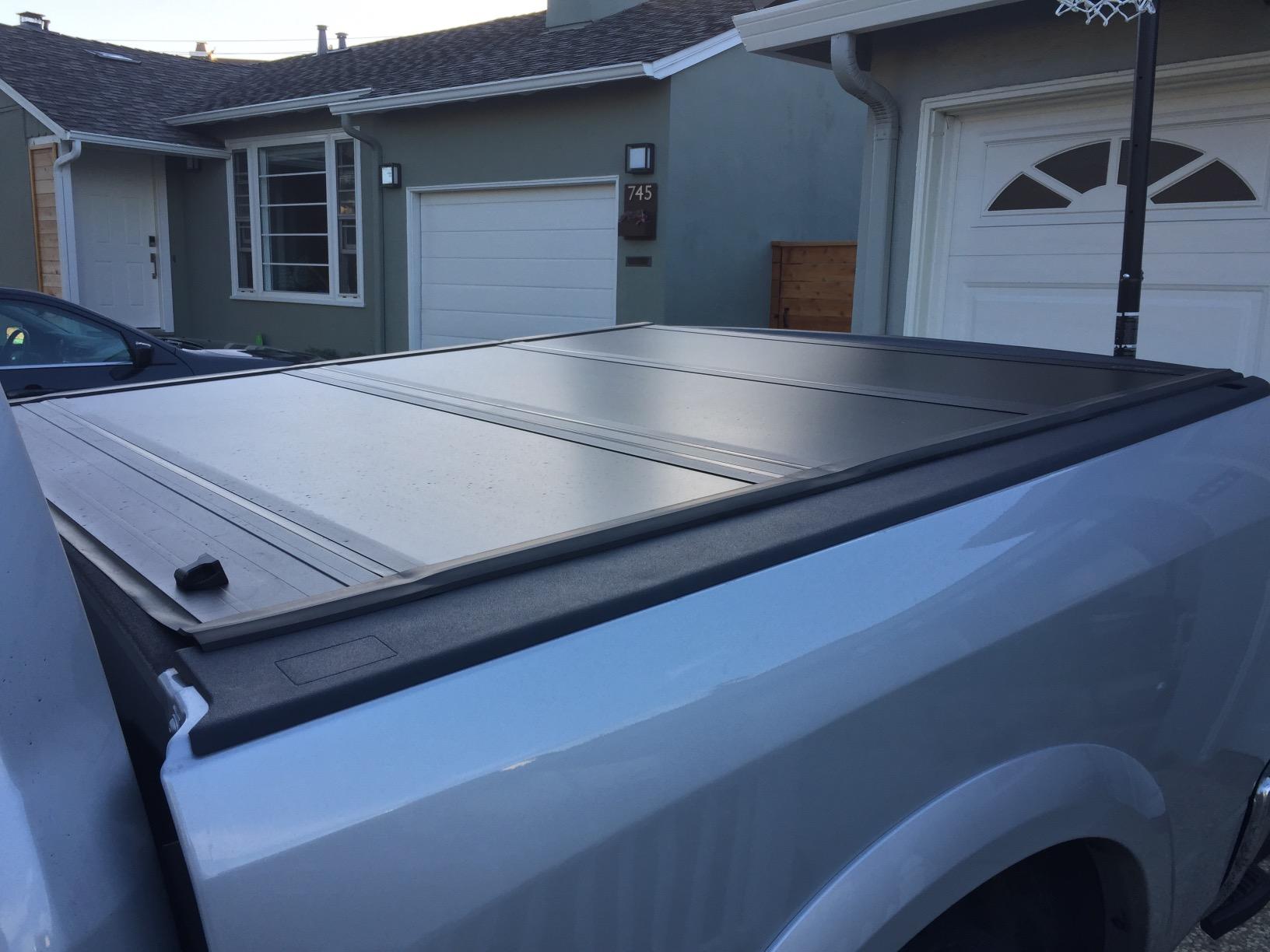 UnderCover Ultra Flex Hard Folding Truck Bed Tonneau Cover | UX32005 | Fits 2009 - 2025 Dodge Ram 1500/2500/3500 8' 2