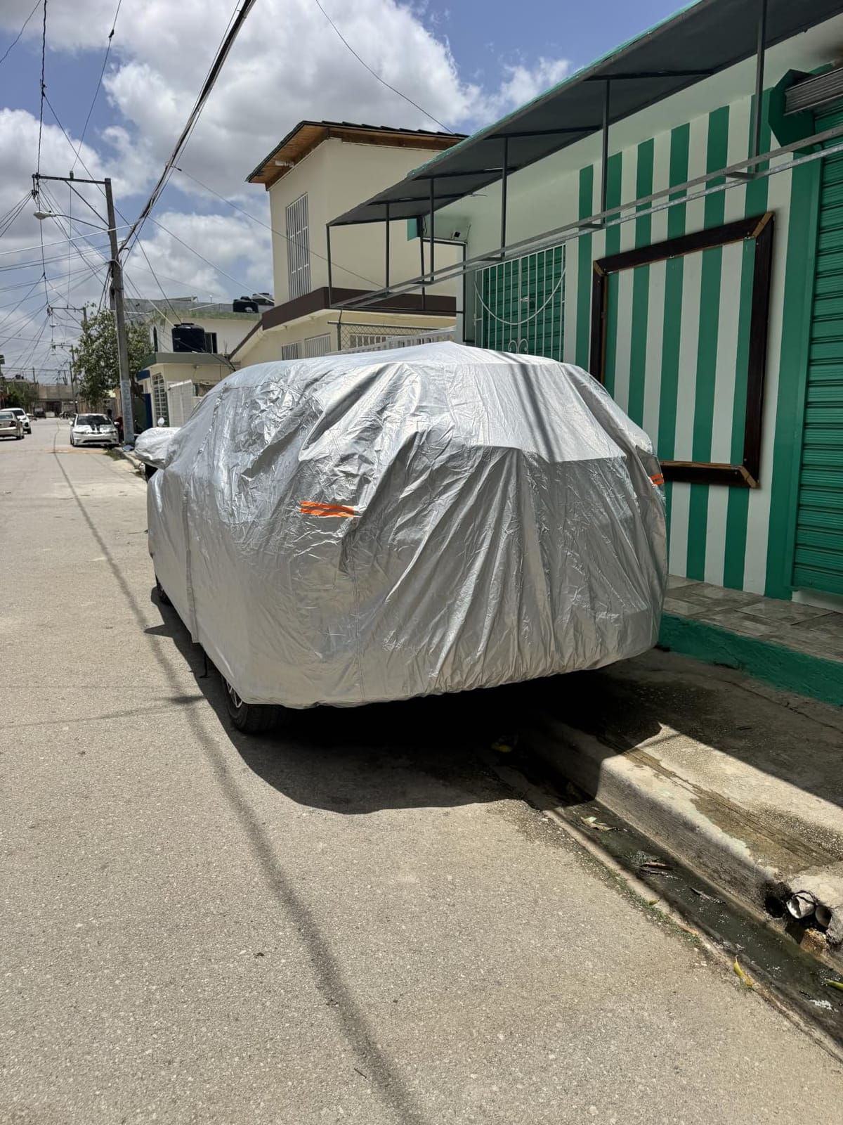 Kayme 6 Layers Waterproof SUV Car Cover for Toyota RAV4 2006-2026 | Thick composite build, 100% waterproof PE-PEVA, reflective aluminum UV shield, inner cotton lining prevents paint scratches customer photo 1