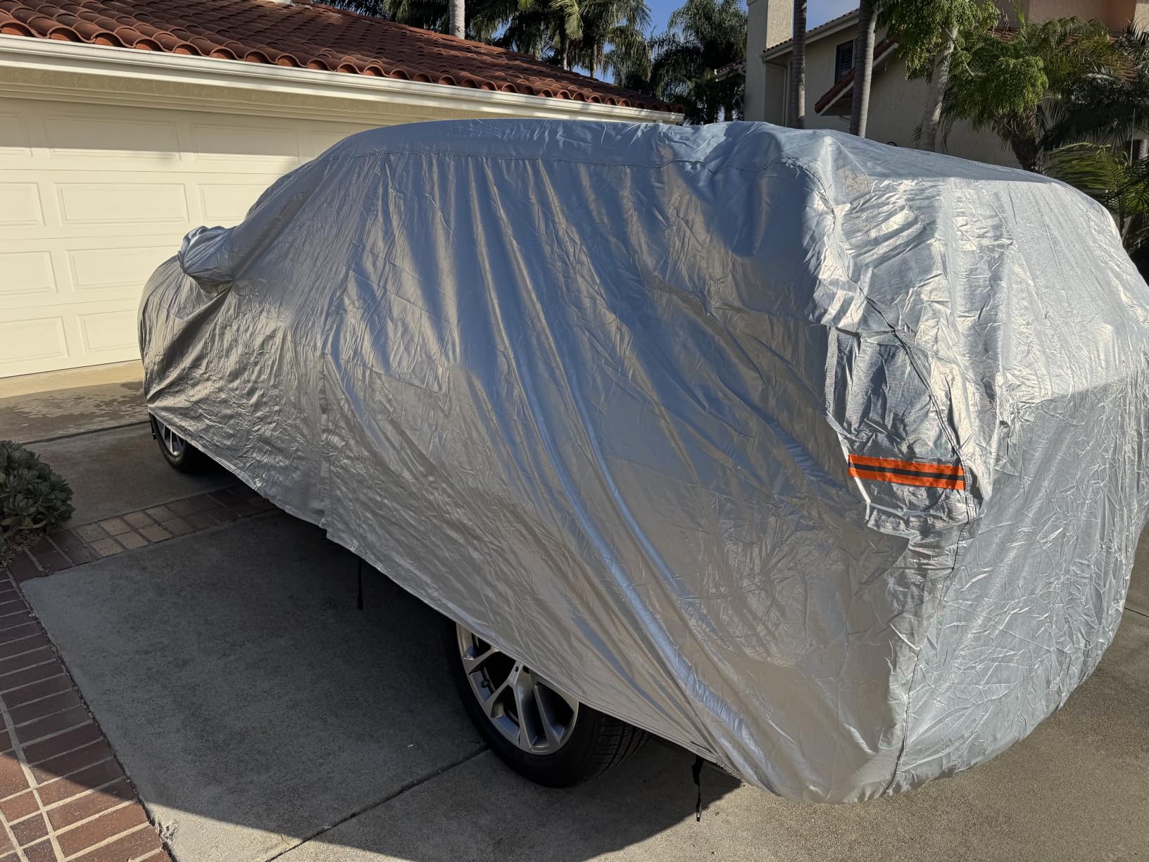 Kayme 6 Layers Waterproof SUV Car Cover for Toyota RAV4 2006-2026 | Thick composite build, 100% waterproof PE-PEVA, reflective aluminum UV shield, inner cotton lining prevents paint scratches customer photo 2