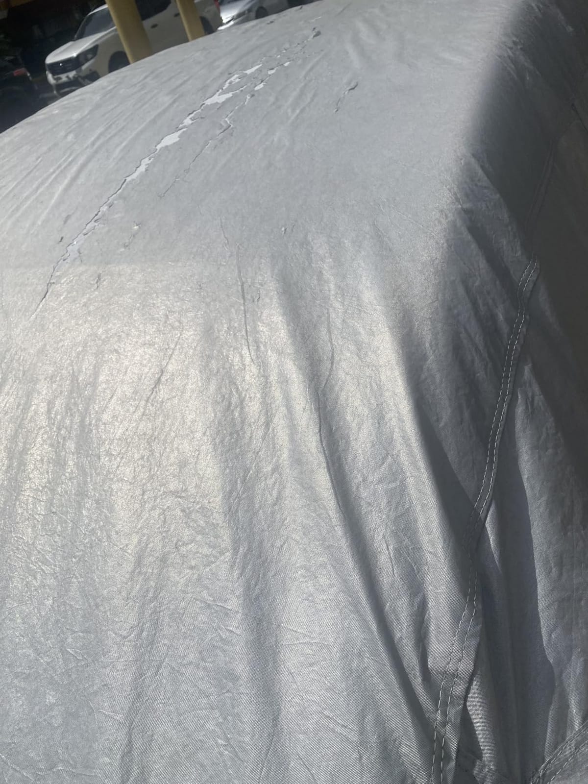 Kayme 6 Layers Waterproof SUV Car Cover for Nissan Rogue 2007-2026 | Thick composite build, 100% waterproof PE-PEVA, reflective aluminum UV shield, inner cotton lining prevents paint scratches customer photo 1