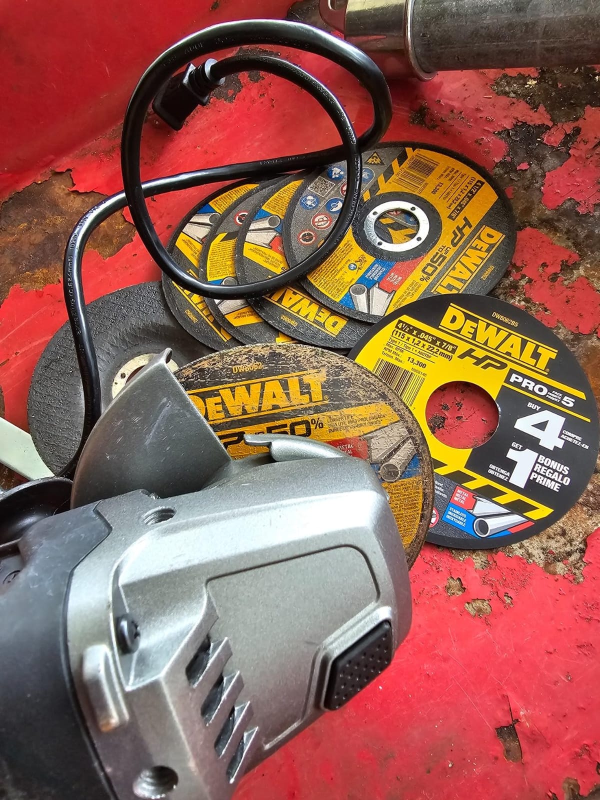 DEWALT 4 1/2 Cut Off Wheel, Angle Grinder Cutting Disc, 5 Pack, Aluminum Oxide Abrasive Chop with 7/8 Arbor for Metal Cutting, Grinding Wheels 4 1/2 in x .045 in (DW8062B5) customer photo 1